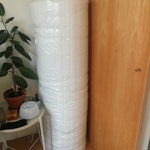 mattress topper for removal and disposal