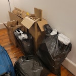 Load of cardboard and 3 bags for removal and disposal