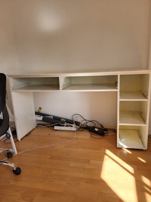 removal of Large wooden desk for 70 from E20 Hackney