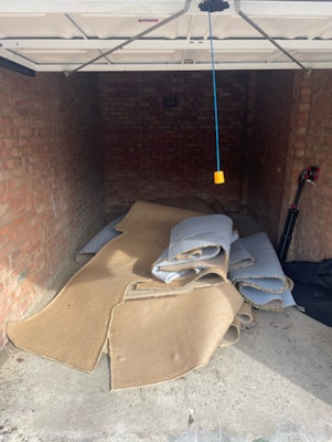 removal of Waste carpet for 70 from GU10 Surrey