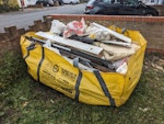 Hippo Skip Bag and Fridge Hippo skip bag with wood, carpets, rubble and general household waste. There's also a fridge/freezer and concrete fireplace mantel. EN11 - removed for £350