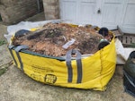 Hippo megabag, A mixture of external wall tiles, garden waste, some soil, general rubbish.  Have cladded the house and this bag is a result of this waste, plus as mentioned garden and general. BN10 - removed for £185