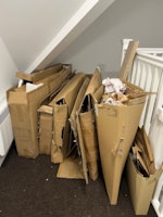 Furniture boxes for recycling collected by Waste Invaders Ltd