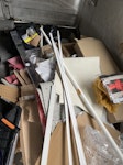 Garage cleanout - carpet etc Old carpet and underlay (from front room and hallway) - some cardboard boxes and waste material from fitted laminate flooring. WV10 - removed for £125