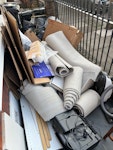 carpet, rubbish, garden waste Carpet off cuts, garden waste, cardboard, general rubbish, disassembled wardrobe, small electricals SW11 - removed for £100