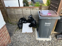 Bags of broken tiles & board collected by Morley’s Rubbish Clearance