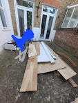 Flooring, door and heater Have about 5sqm of wood flooring. Its glued together so its about 3 long. There is also some long pieces of skirting board, a door and a broken electric heater. 

It may be possible for us to break up the length of the floor and skirting for easier pick up. SE6 - removed for £60