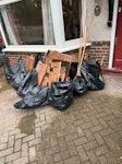 parkay flooring rubbish 10 bags plus large pieces of parkay flooring for removal SE25 - removed for £70