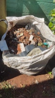 Hefty bag of builders waste collected by N J Recycling Services