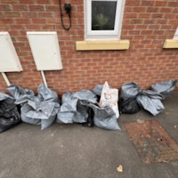 18x half full bags of soil collected by C Leighton Trading