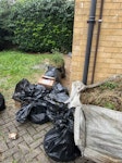 mix of household & garden First picture is garden waste, cutting from foliage, grass etc. Second is normal rubbish found in garden, third & fourth are reusable cardboard, 3 x broken desks & bits of wood.
It’s all piled up in order at front of house by the bins so can be accessed any time, there’s a drive & easy access don’t need to disturb house, so can be picked up anytime E6 - removed for £280