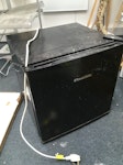 domestic mini fridge old fridge - keeps tripping the switch, might need a new motor or reused for parts? 

The building is commercial property (business address)  but the fridge is a very small domestic one. E4 - removed for £50