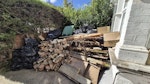 Garden and wood waste Garden waste and wood and pieces of fence post and broken garden tiles N15 - removed for £220