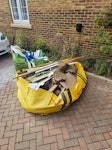 One hippo and one tonne bag One tonne bag, fifty percent full of sharp sand (could be reused) and a hippo bag full of soil and cut wood (skirting boards and MDF) TN12 - removed for £280