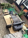 mdf, garden waste mainly mdf from broken up wardrobes, old metal barbecue, garden type waste, small cut up tree trunk BN1 - removed for £60