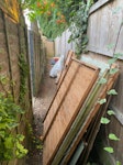 Mix of garden&household junk Large pieces of shed panelling, small pieces of wood, a few metal pieces, shed felt,2 bags of rubble (mostly small bits of rotten wood and some soil),1 carpet roll (reusable), 1 cabinet,1 water butt (can be reused),2 planters with some soil in one of them,1 broken tile.It’s all piled up in order in the back of the garden TW12 - removed for £225