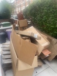 cardboard and a pallet cardboard boxes and a wooden pallet W12 - removed for £100