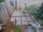 Shed panels, wood, garden wast Wooden shed panels, 12 concrete shed panels, big lumps of old wood, brambles' metal sticks IG6 - removed for £180