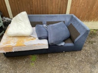 Sofa plus some general junk collected by Ican Services