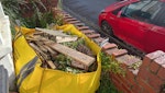 Bag of garden waste/rubble 1.5t skip bag of green garden waste, bricks/rubble and old fence bits. Easy access at front of house, but narrow street (9ft between parked cars). Can coordinate to try and move cars from street next to it for collection. BS5 - removed for £180