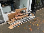 Wood and boxes and some pipes Cardboard boxes, wood shelving, old pipes and some junk SE1 - removed for £90