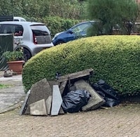 Paving slabs, bags of rubble collected by Quick Junk