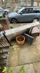 mattress, flower pots, soil, mattress, 3 large flower pots with some soil and 2 plastic food bins. NW3 - removed for £70