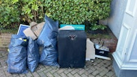 Suitcase, couple bags and sign collected by All Waste Ldn LTD.