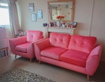 Sofa and armchair. Reusable. Sofa and armchair. Reusable in good condition. Only 18 months old. Pink velvet material. Fire tags still attached. Building has a lift large enough for items. One man brought the items in so assume can be taken out as easily if legs removed. Could also be collected Saturday BN3 - removed for £75