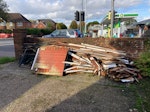 wire fencing, broken up shed rolls of wire fence, remains of large shed rotten in parts including roofing felt, some metal poles HP20 - removed for £300