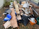 Bathroom renovation rubbish Builders bags of tiles, rubble, cement board, floor boards, off cuts of wood and general builders waste. LU5 - removed for £325