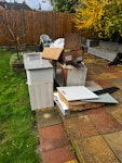 two kitchen units and bits 2 x 900mm wide kitchen units , sink and some wood panels and cardboard. LU7 - removed for £60