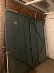 Metal garage door and old tumb Metal garage door, old tumble drier LE2 - removed for £50