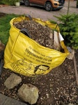 Small Hippo Bag A small hippo bag filled with construction rubble and garden waste. Construction rubble consists mainly of broken pieces of cornices, skirting, plasterboard, carpet, timber and metal parts. ME2 - removed for £75