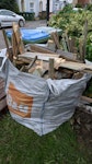 2 x 750kg bags. mixed garden waste. old broken fence some stones and weeds SO15 - removed for £120