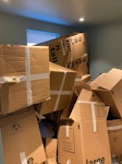 Approx 25 cardboard boxes Lots of cardboard boxes. Can be broken down for removal. 3 other bags of paper/rubbish. 1st floor of the flat collection. N1 - removed for £50