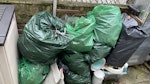 rubbish & garden waste There are several bags of garden waste and other assorted bits of rubbish. NW6 - removed for £60