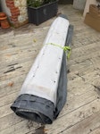 Hot tub lid rolled up We have rolled up hot tub lid , on drive 2.4metres by 0.5 m diameter 
Approx 80 kg 2 man lift and we can help RH2 - removed for £80