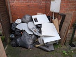 See pictures About 2m3 of trash, partly bagged. Includes stripped wallpaper, old carpets and underlay, plaster, parts of kitchen cabinet. In addition, radiator cover (see picture) and old washing machine.
Access to private driveway (everything but the washing machine is already piled up next to the driveway). SL5 - removed for £125