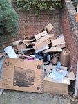 carseat boxes bags end table lots of cardboard boxes, small end table, car seat, a couple of large bags of rubbish DA17 - removed for £145