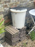 GARDEN WASTE REMOVAL - roof tiles and bin (roof tiles reusable)
- garden debris at back of garden 
- garden waste E9 - removed for £100