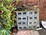 Building waste and furniture Six breeze blocks and about 20 bricks, 1 concrete post and small amount of wood plus 3 plastic garden chairs. A small amount of garden pots/items. Part of sette corner unit. BB1 - removed for £180