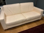 2 x sofa + footstool Cream leather sofas - 1x 2 seater, 1x 3 seater, footstool
Missing fire labels KT24 - removed for £140