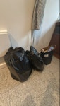 2 black bin bags household waste SW7 - removed for £40