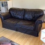 Large 2 seat sofa & Club Chair Laura Ashley Leather Sofa
Large 2 seater in dark brown leather. Good condition.
Seat cushion interiors replaced with medium firm foam.
Length. 173cm (5ft 8in)
Width. 90cm.(2ft 11in)
Max height. 82cm (2ft 8in).

Tub Chair
Faux leather in dark brown with loose covers available
Reasonable condition but small tear in cushion cover.
75cm all round GU10 - removed for £100