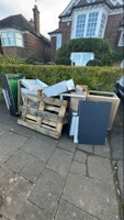 3 kitchen cabinets collected by SID WASTE LTD