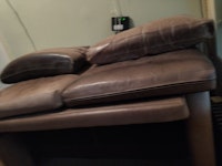 4 seater leather sofa.220cm collected by T's Waste Removal