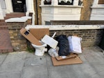 Toilet and cistern. Bags Toilet cistern and bowl. Building and cardboard waste W14 - removed for £70