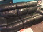 Sofa - 3 seater recliner Black leather 3 seater electric recliner sofa. Frame under one end seat is broken. GU2 - removed for £120