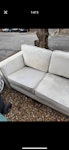 2 seater grey sofa Two seater sofa outside the property. It was covered but due to the weather it’s no longer covered. May be able to be cleaned and reused but no guarantee. Tried council but cannot collect till January for £27 SA13 - removed for £70